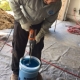 Mixing The Epoxy Solution To Prepare For Pipe Lining A Damaged Sewer Drain Pipe
