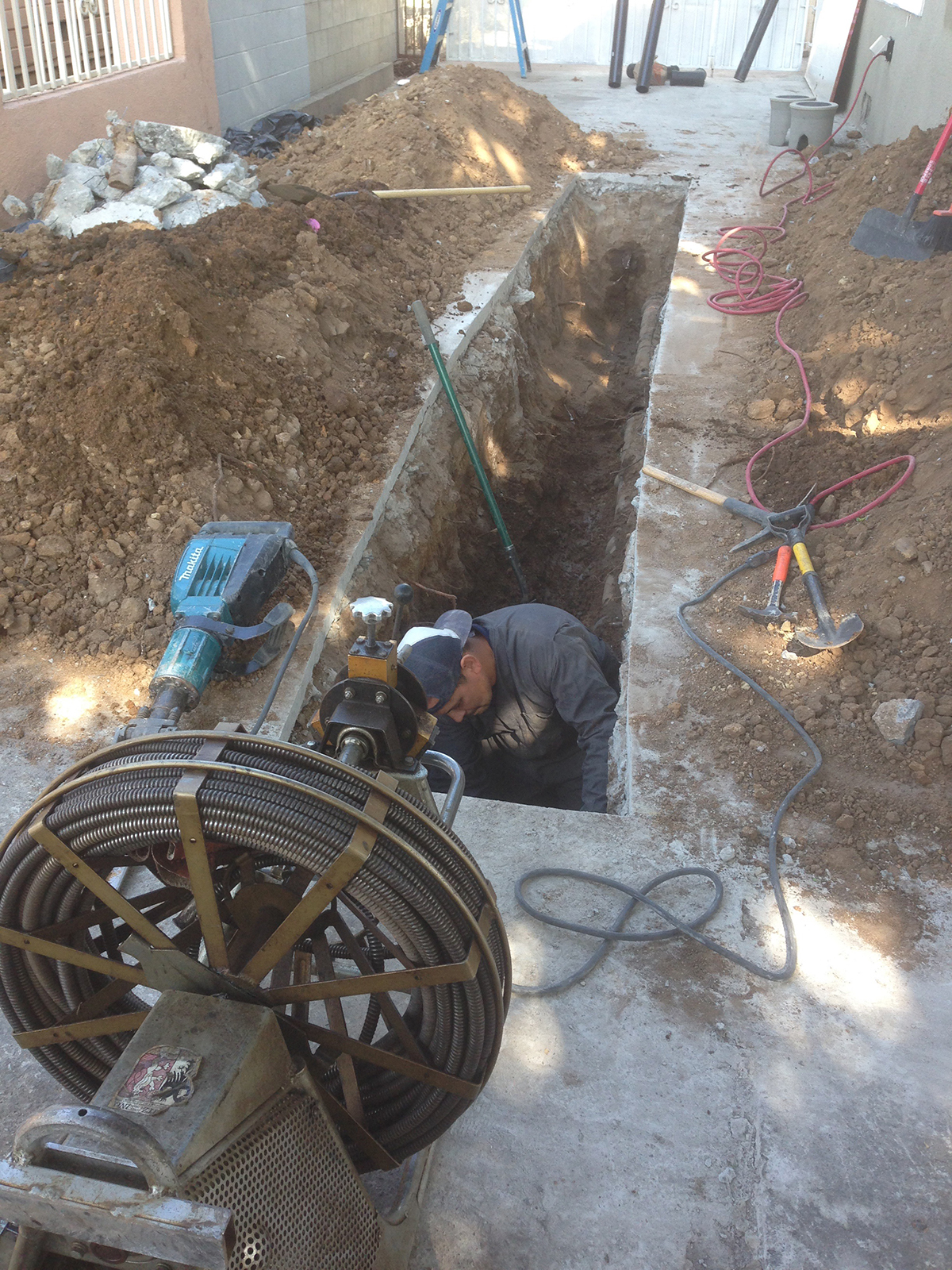 Replacing Main Sewer Line & Snaking Existing Line