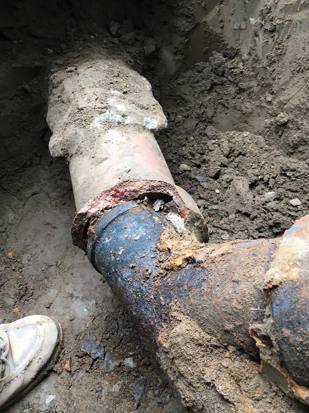 Fixing Broken Sewage Pipe Line