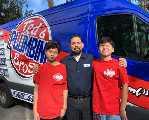 Plumber Ted Bustos and His Two Sons